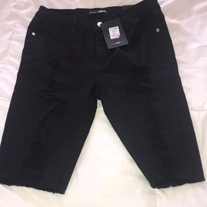 FASHION NOVA Black Bermuda Distressed Shorts